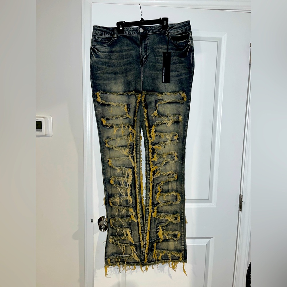 Edgy Distressed Stacked Flare Jeans